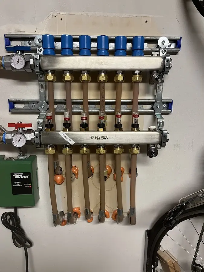 Plumber performing Water Heater Repair at a residential property in Montgomery